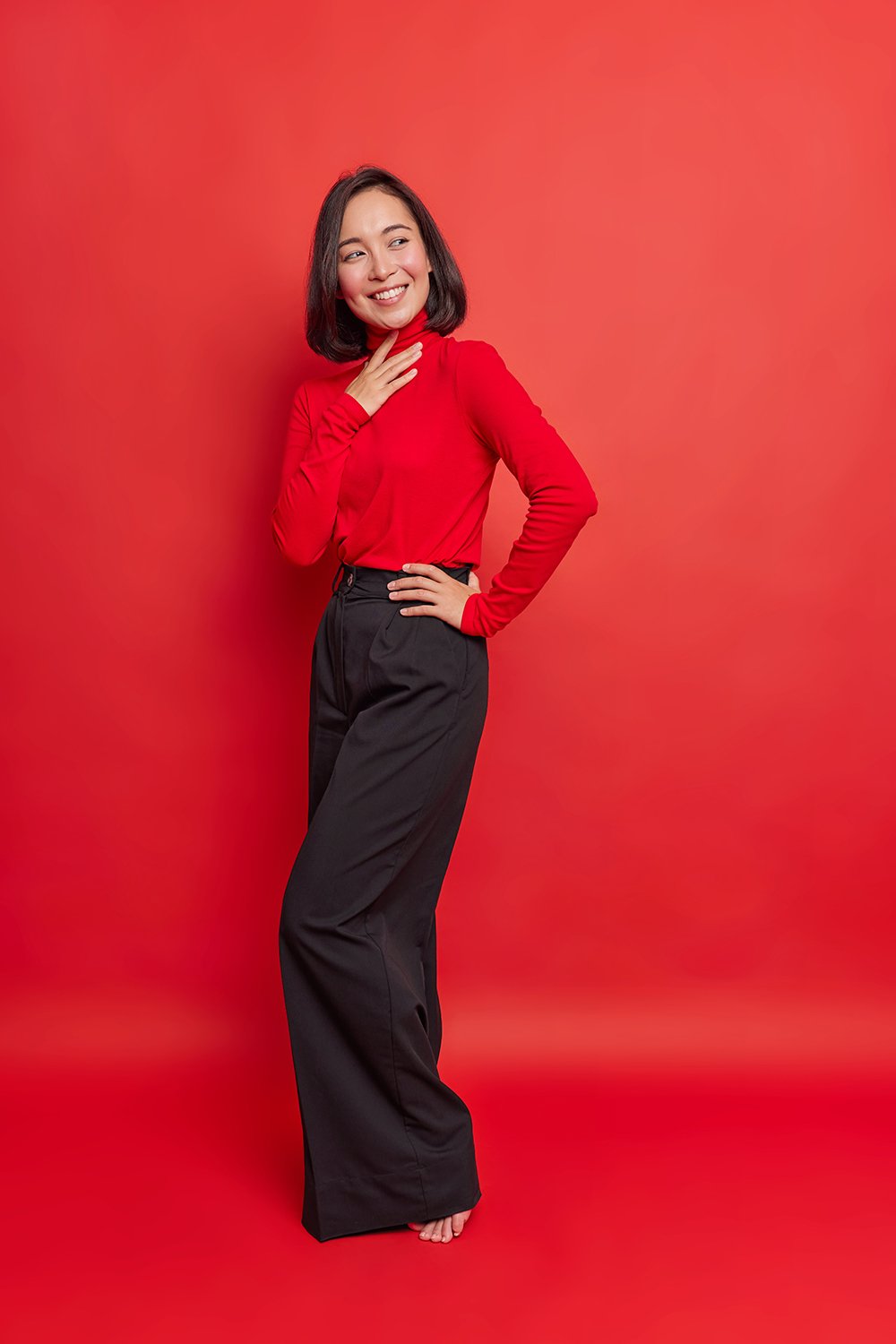 vertical-shot-of-good-looking-asian-woman-with-dar-2026-01-11-08-16-31-utc